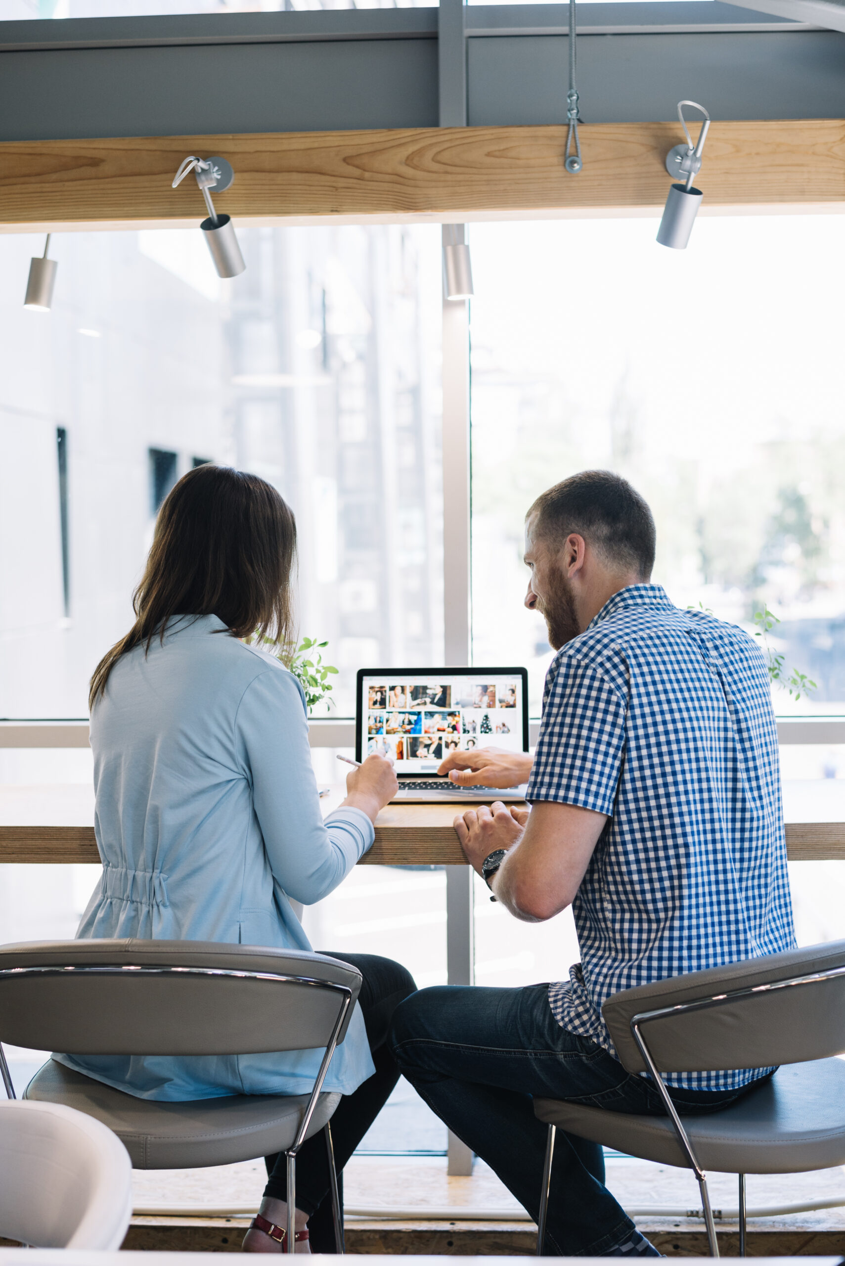 Back View Colleagues Working Laptop 1 Scaled